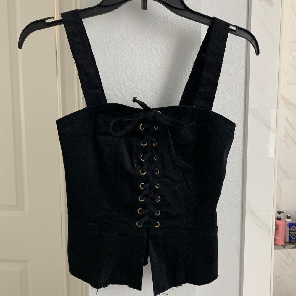 About Us  NWT corduroy black lace up top  sz XXS